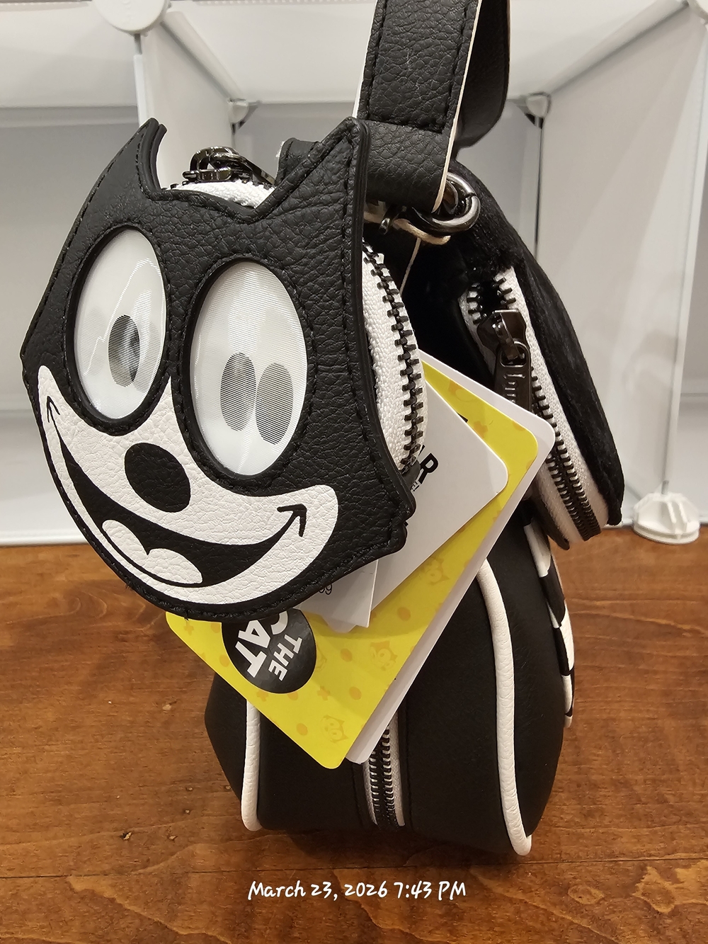 Loungefly Felix the Cat Crossbody Bag featuring removable lenticular coin purse